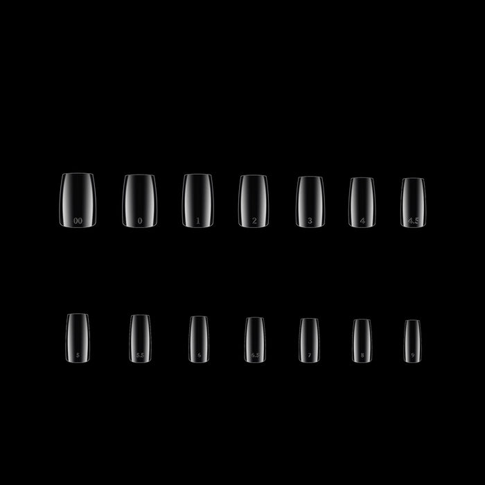 Multiple clear nail tips arranged in a grid on a black background