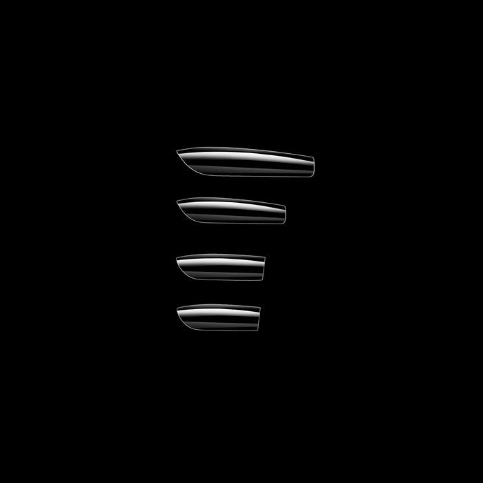 Clear nail tips on a black background