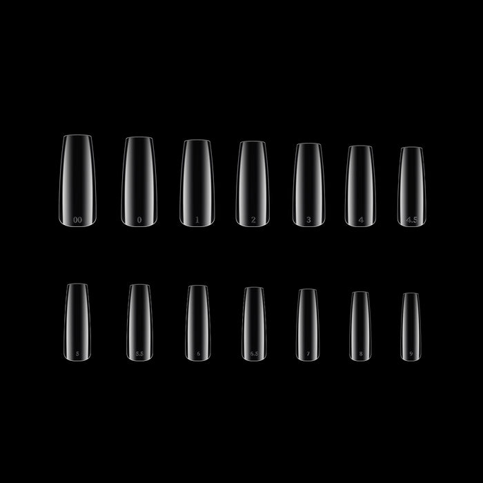 Multiple clear square nail tips arranged in two rows on a black background
