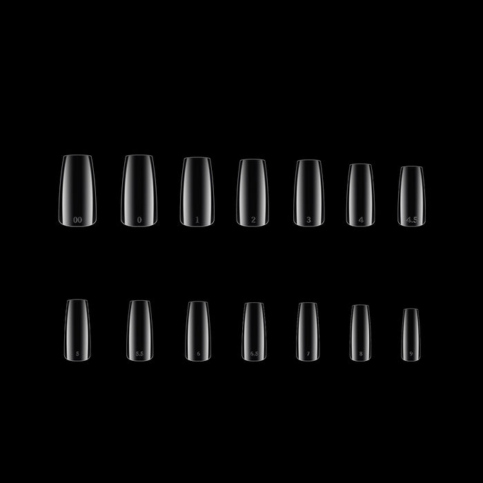 Multiple clear square nail tips arranged in a grid on a black background