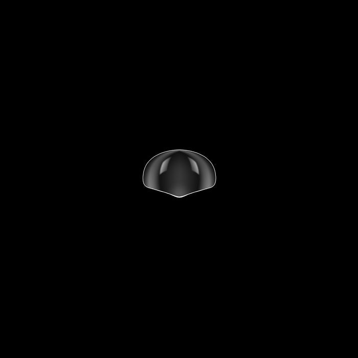 Clear nail tip on a black background