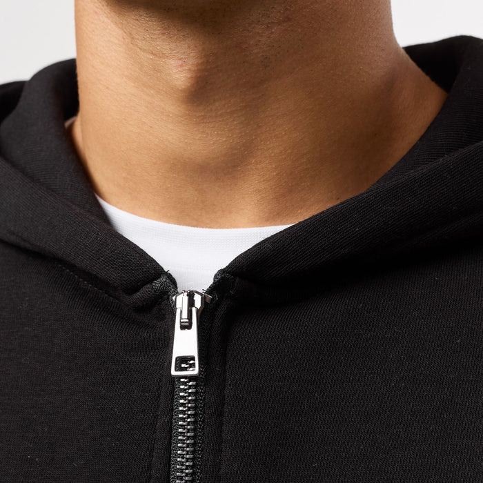 Close up of zip detailing on black full zip up hoody