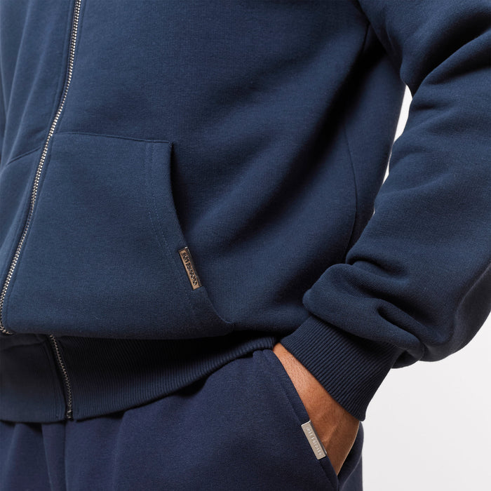 Zoom in on branded detailing on kangaroo navy pocket