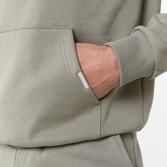 Branded kangaroo pocket 'Closure London' on mens hoodie in light green