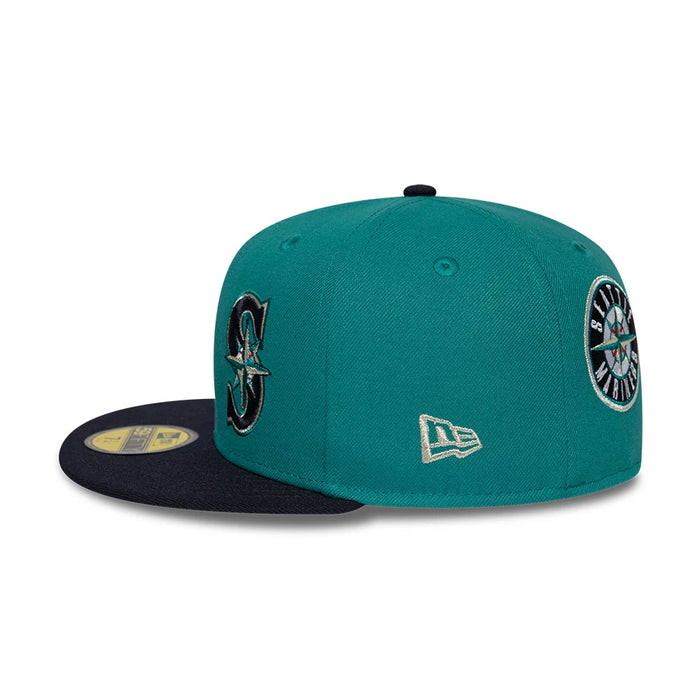 Pictured is this MLB Multi Logo Seattle Mariners 59FIFTY Fitted cap in green. 7