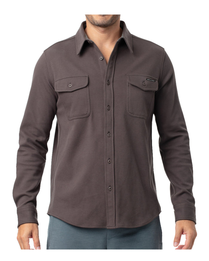 Front view of Selkirk Banks Chambray Button-Down Shirt showcasing long sleeves and two chest flap pockets on a model