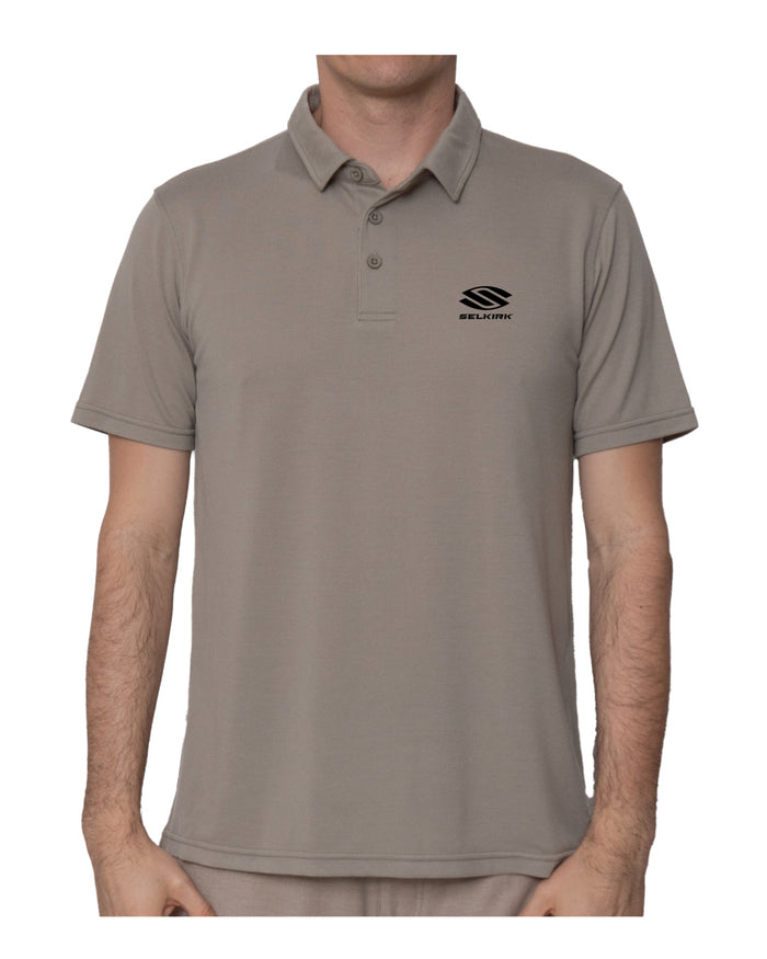 Male torso wearing gray short-sleeve polo with Selkirk S logo and 'SELKIRK' text on left chest.
