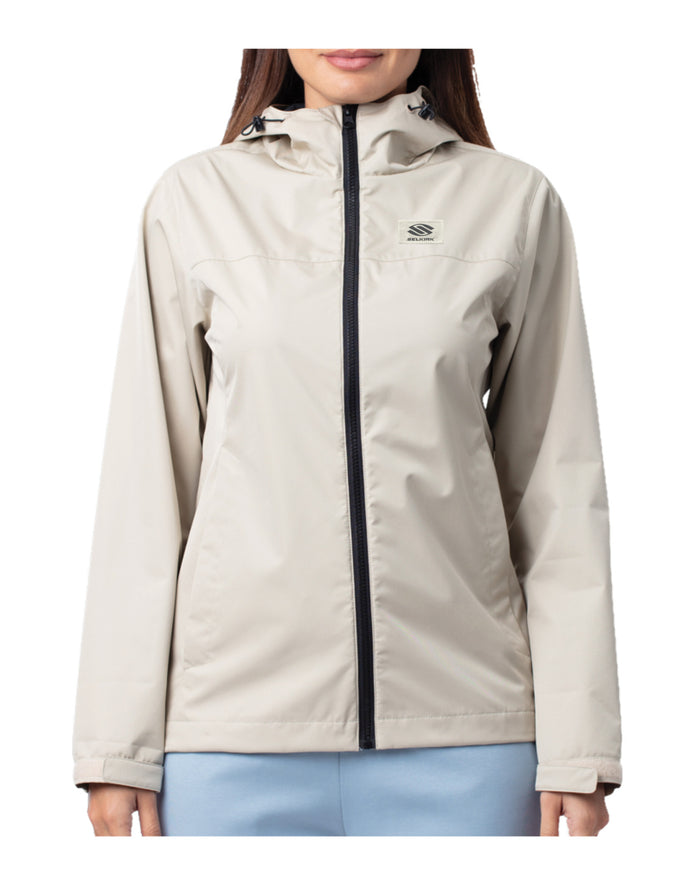 Front view of Selkirk Spring Owen Tina women's hooded windbreaker in beige showing black zipper, hood and chest Selkirk logo on white background