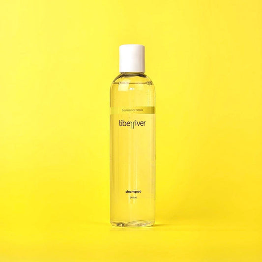 Bottle of LibeRiVe on a yellow background