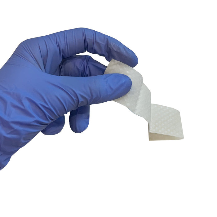 Skin-Tac Adhesive Barrier Wipe in hand