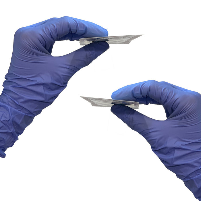 Skin-Tac Adhesive Barrier Wipe in hand