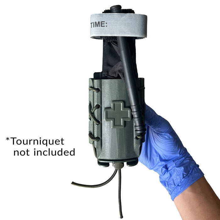 Slick Kydex Tourniquet TACO®, Green - In hand showing tourniquet inside