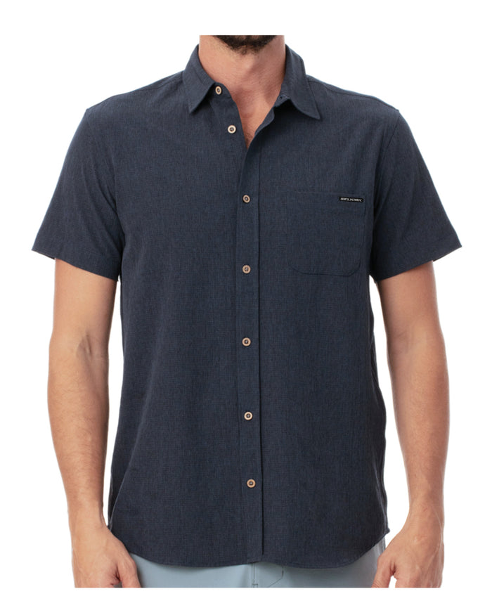 Men's navy short-sleeve button-up shirt with chest pocket and small black logo tag, front view.