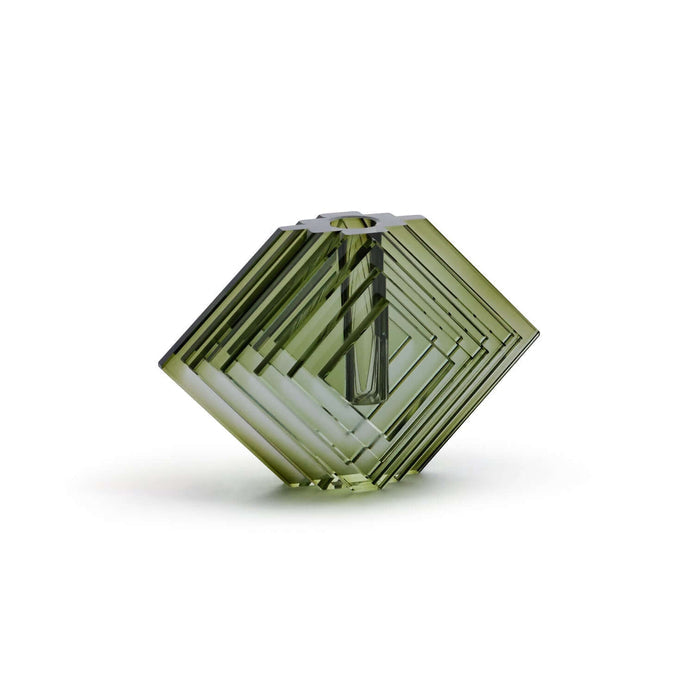 Green geometric crystal on a white background