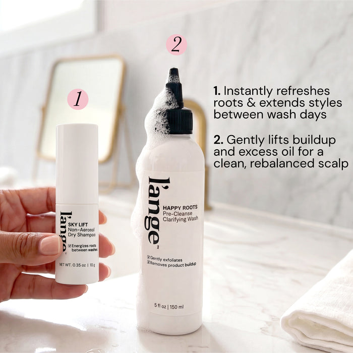 Sky Lift Non-Aerosol Dry Shampoo and Happy Roots Pre-Cleanse Clarifying Wash bundle steps/explanation. 1. (Sky Lift) "Instantly refreshes roots & extends styles between wash days" 2. (Pre-Cleanse) "Gently lifts buildup and excess oil for a clean, rebalanced scalp"