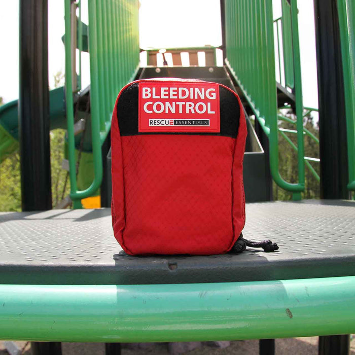 Bleeding Control Station IFAK -  Advanced pouch containing Stop the Bleed products,  on playground equipment