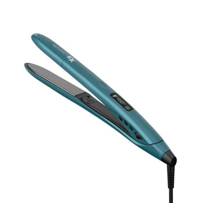 Teal hair straightener on a black background