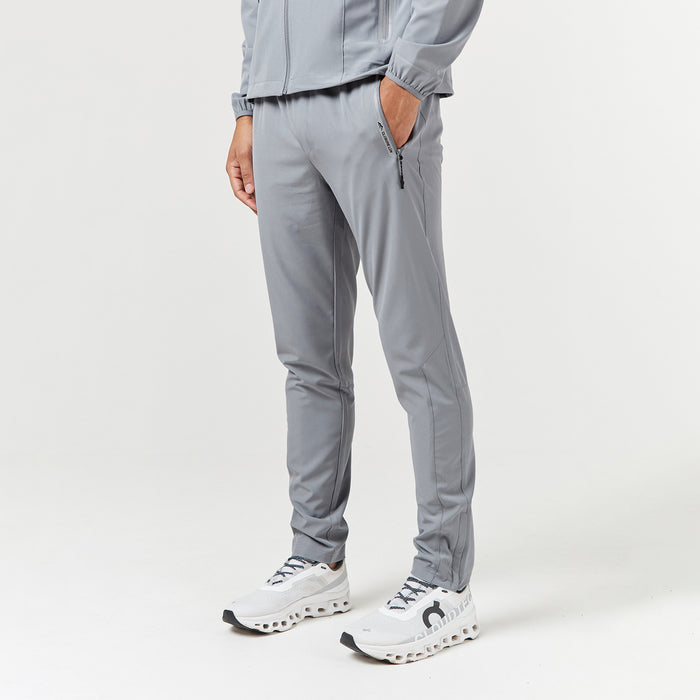 Close up of men's grey technical tracksuit pants
