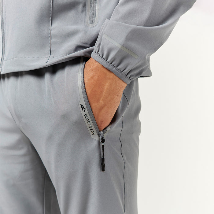 Close up shot of male hand in side pocket of Closure London tech pants