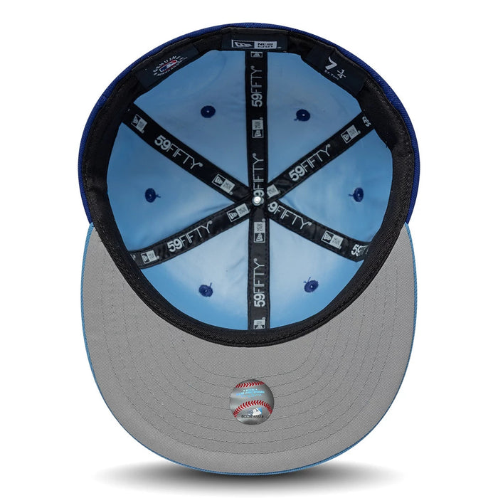 Pictured is this MLB Multi Logo Texas Rangers 59FIFTY Fitted cap in dark blue. 2