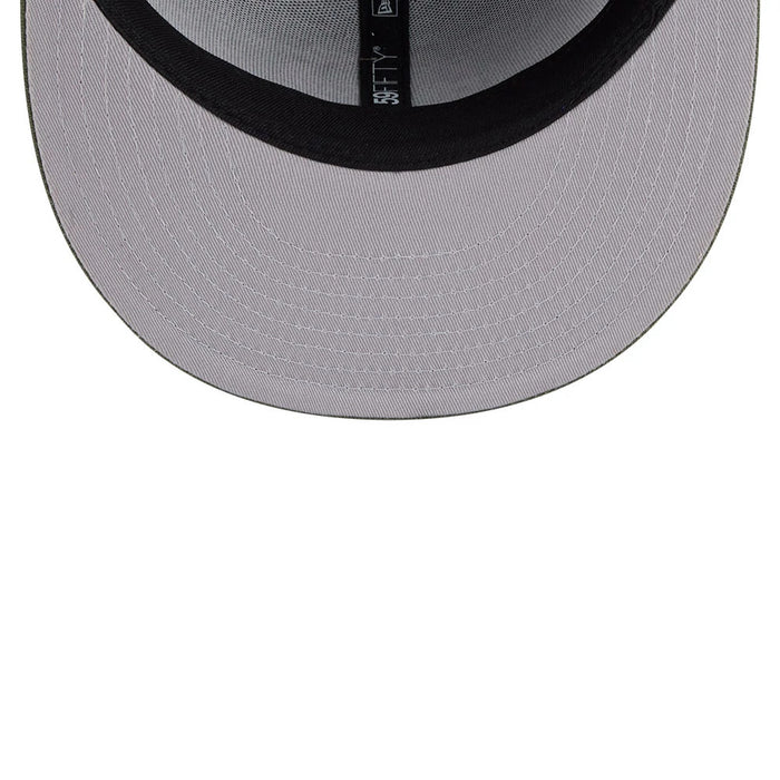 Pictured is this Top Gun 59FIFTY Fitted cap in green. 2