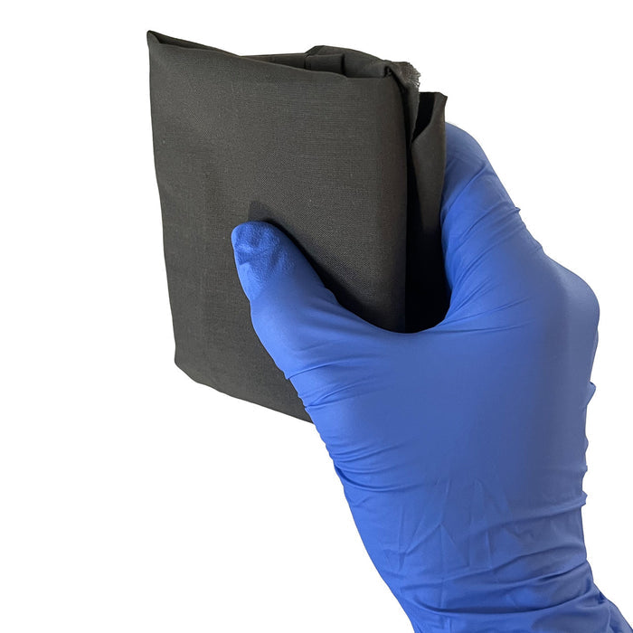 Rescue Essentials Triangle Bandage, Folded in hand