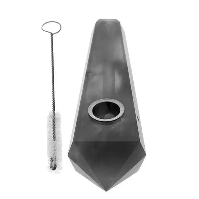 Front view of the Valiant Crystal Pipe - Opal, showcasing its sleek, dark glass design and a cleaning brush beside it.