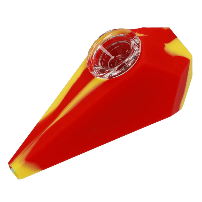 Angled close-up of a red-and-yellow Valiant Silicone Diamond Pipe - Assorted showing its faceted body and clear bowl.