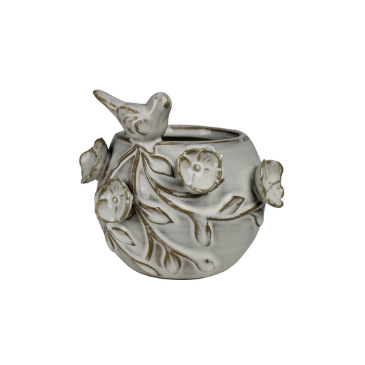 Ceramic vase with sculpted bird and floral relief, white with gold accents