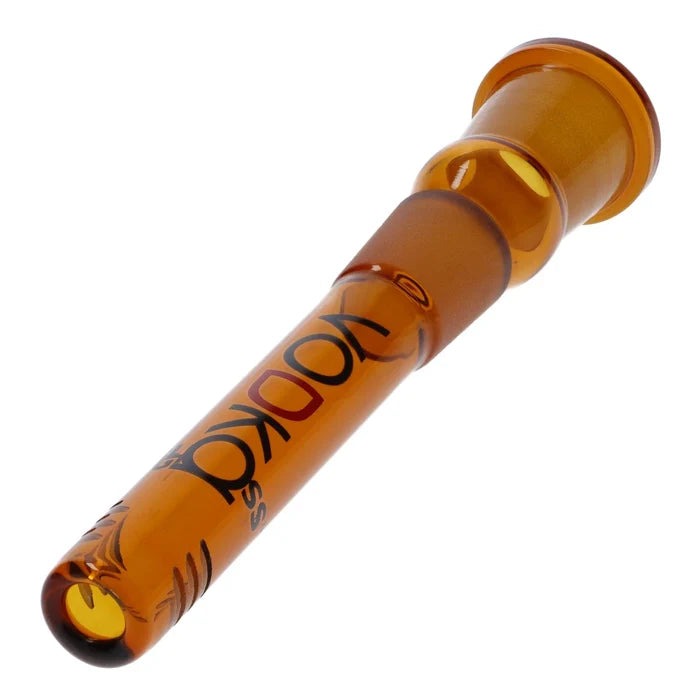 A downward-angle shot of the 100mm Vodka Downstem in amber glass, showcasing its clear, cylindrical design.