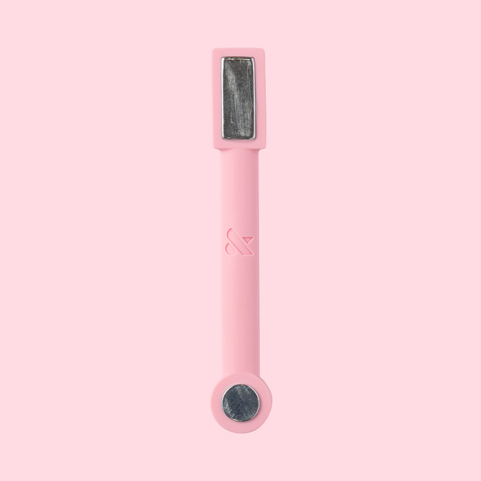 Wanda magnetic wand in soft pink designed for creating unique nail art effects during at-home manicures.