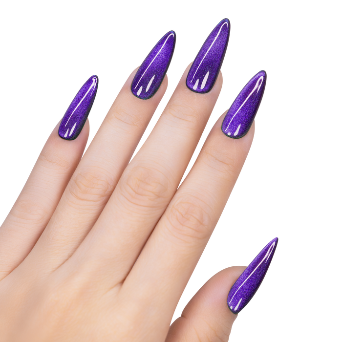 Hand with purple glittery nail polish on a white background