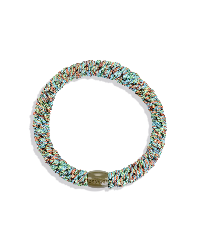 Woven glitter hair tie in teal, aqua, and silver with a white center