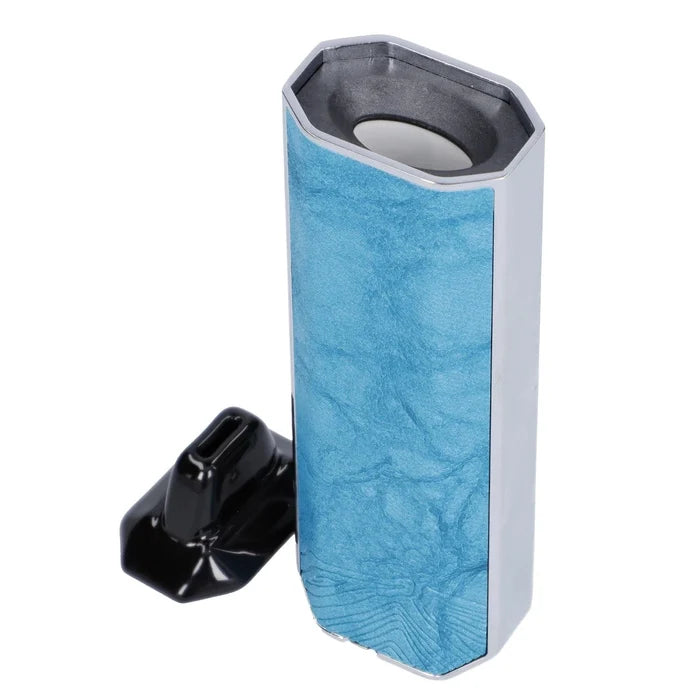 Angled close-up of the blue Xvape Aria Dual Use Vaporizer showing its octagonal top chamber, textured blue panel, and a detached black mouthpiece.